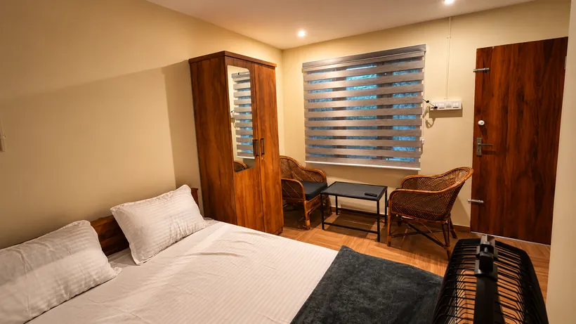 The bedroom and seating corner
