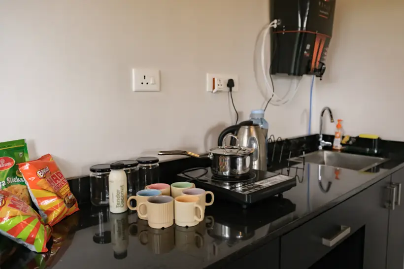 Kitchenette with kettle, induction cooktop and water purifier